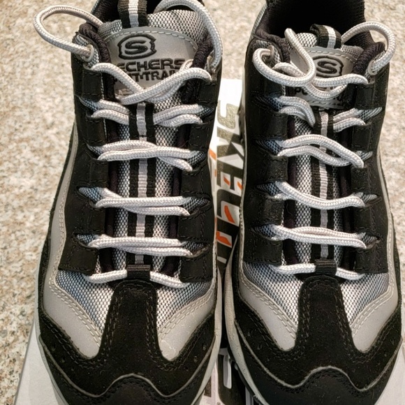 black and silver skechers